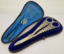 A pair of Victorian silver grape scissors, of pierced foliate decoration, hallmarked Sheffield 1890,
