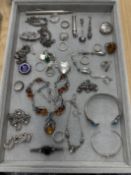 A collection of silver jewellery including earrings, bracelets, rings, silver pill boxes etc.