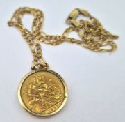 A Victoria 1887 full gold sovereign on a 9ct gold chain, mounted, approx 15.5g.