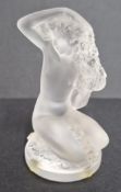 A Lalique crystal figure 'Floreal' depicting a kneeling nude figure in frosted crystal, engraved '