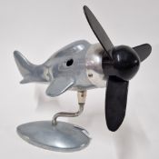 A Sarsaparillo Art Deco style fan in the form of an aeroplane, body marked indistinct '