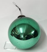 A very large Green reflective bauble or witches ball, with hanging mount, approx diameter 28cm. From