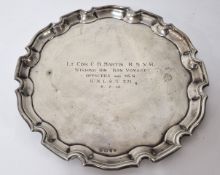A silver salver, hallmarked Birmingham 1932, inscribed 'Lt. Cdr. C.R.Martin. R.N.V.R, Wishing Him 