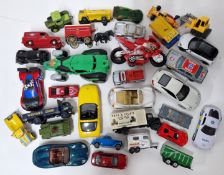 A collection of model cars and vehicles, to include Days Gone, Vanguards, Maisto, and others.