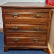 A three-drawer chest of drawers, approx height 82cm, width 77.5cm, depth 50cm.