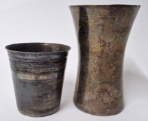 Two white metal beakers, total weight approx 9.65oz. From the Estate of the Late Tony Martin.