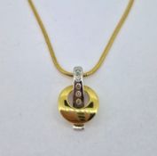 An 18ct yellow gold pendant set with five diamonds on an 18ct yellow gold chain.