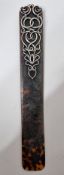 An Art Nouveau silver and tortoise shell page marker, swirling silver decoration hallmarked London