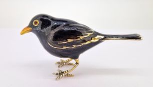 A silver and enamel blackbird, length approx 9cm, weight approx 2.35oz.