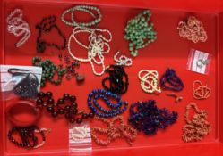 A mixed lot of bead necklaces including coral necklaces etc.
