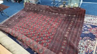 A patterned rug, approx 300cm x 400cm.