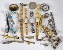 A mixed collection to include dress watches, jewellery, brooches etc.