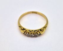 A small five stone diamond ring, set in 18ct gold, size K/L, approx 2.4g