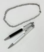 Swarovski dress necklace together with two Swarovski pens.