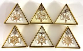 Swarovski Crystal Glass, a collection of six SCS Christmas stars including 2011, 2013, 2012, 2015,