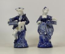 A Pair of Mintons Sweetmeat Dishes in the form of a girl and boy in 18th century dress. Height: 19cm