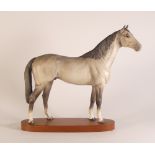 Beswick Grey Hunter Connoisseur Horse presented on a wooden plinth. (H: 34cm)