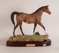 Royal Doulton The Champion on wooden plinth, horse detaches from the base. (H: 33cm)