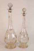 William Hutton, Birmingham, 1920, two Silver Collar cut Crystal decanters with fish and flora