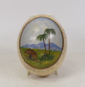 A Vintage Painted Emu Egg with tribal scene to front.