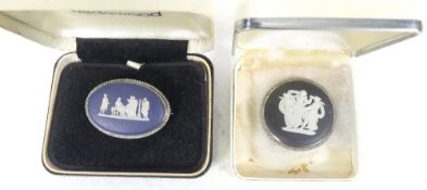 Wedgwood, Two Silver-mounted Cameos in Black and Dark Blue Jasperware mounted as Brooches
