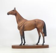 Beswick, Connoisseur Model of Red Rum on wooden base.