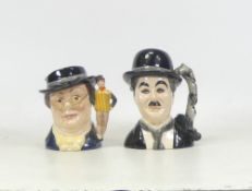 Royal Doulton, Small Character Jugs Charlie Chaplin D71454 and Mr Pickwick D7025 (2)