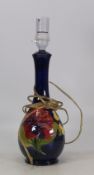 Moorcroft table lamp in the Hibiscus pattern on cobalt blue ground, height to top of ceramic 27cm.
