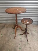 Two wine tables, one oak one mahogany, height of tallest 71cm (2).