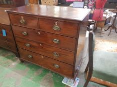 Chest of mahogany two short over three long drawers, raised on bracket fee (1 foot a/f) W 109cm.
