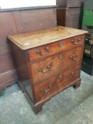 Victorian chest of three drawers raised on bracket feet, with heavy brass handles, W 72 cm x H