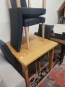 Modern fold-out beech effect dining table and 4 chairs.