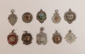 A collection of Antique Silver shield medals,including enamelled cricket & swimming medals 105.1g (