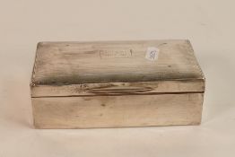 Silver desk cigarette box, inscribed 1932-1957, wood lined and filled base, 411.9g,16 x 9cm.