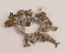Silver charm bracelet set with 14 large quality charms, 154.5g.