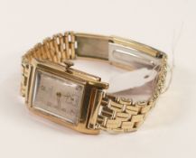 9ct gold Record rectangular wristwatch with rolled gold bracelet.