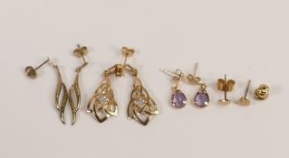 A collection of 9ct gold earrings, amethyst pair, diamond pair etc 2.6g.