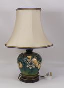 Moorcroft, Passion Flower Design Table Lamp. Height: 28cm including lamp fitting (unchecked) with