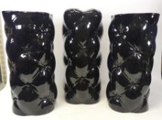 Likely Wade, Table lamp together with two vases. Modelled as buttoned cushions in black. Height: