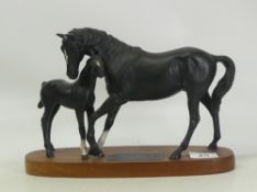 Beswick, model of Black Beauty and Foal on wooden base.