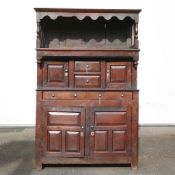 18th century Welsh Tridarn cupboard. Of panel construction with top section having shaped apron.