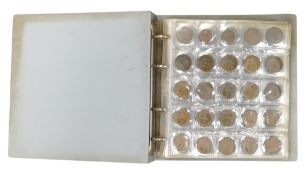 Coin collection in album containing approx. 599 grams of pre 1947 UK silver coins, together with