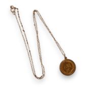 One tenth of Krugerrand coin, mounted in 9ct gold mount and chain, 5.4g.