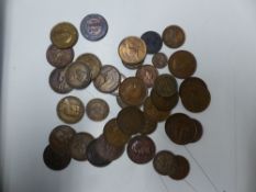 A collection of bronze/copper Commonwealth coins.