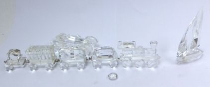 Swarovski Crystal Vehicle items to include Locomotive model 015145 together with train tank wagon,