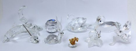 A collection of small Swarovski Crystal animal figures to include a Dolphin, Mallard, Kudu, Snail,