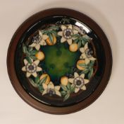 Moorcroft Plate 783/10, Passion Fruit designer Rachel Bishop on a dark green ground measures 30cm