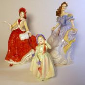 Royal Doulton figurines, Christmas Day 1999 HN4214 and Rebecca HN4041 (both seconds), together
