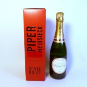 Two bottles of sealed champagne, a boxed bottle of Piper Heidsieck Cuvee Brut and a bottle of