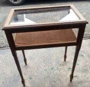 Carved golden oak Bijouterie table with hinged top suitable for jewellery/silver display, raised on